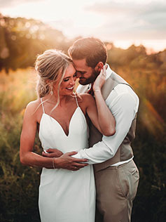 Bride and groom at sunset